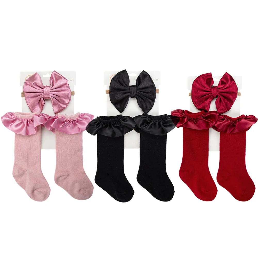 3 ピース/ロット固体サテンフリル膝ベビーソックス 0-12 メートルソフトコットン固体幼児男の子女の子弓ナイロンヘアバンドロング靴下暖かい脚