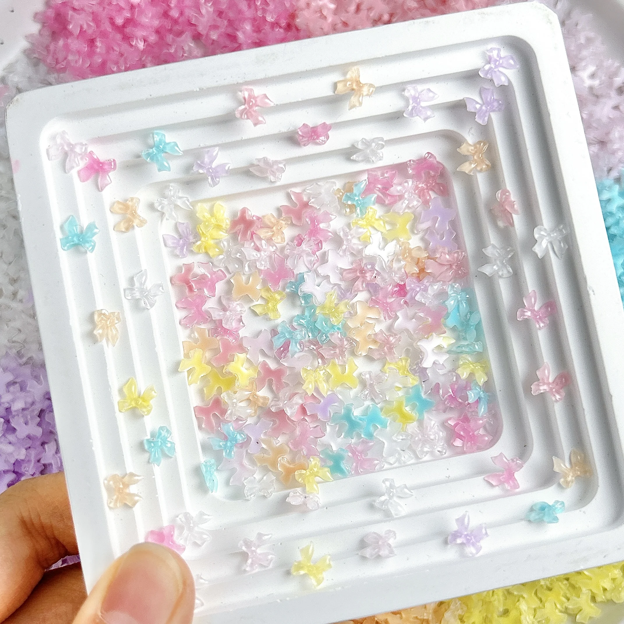 100 Uds Mini lazos de cinta de gelatina dijes para decoración de uñas lazos coloridos translúcidos accesorios de resina para uñas DIY decoraciones para uñas manualidades