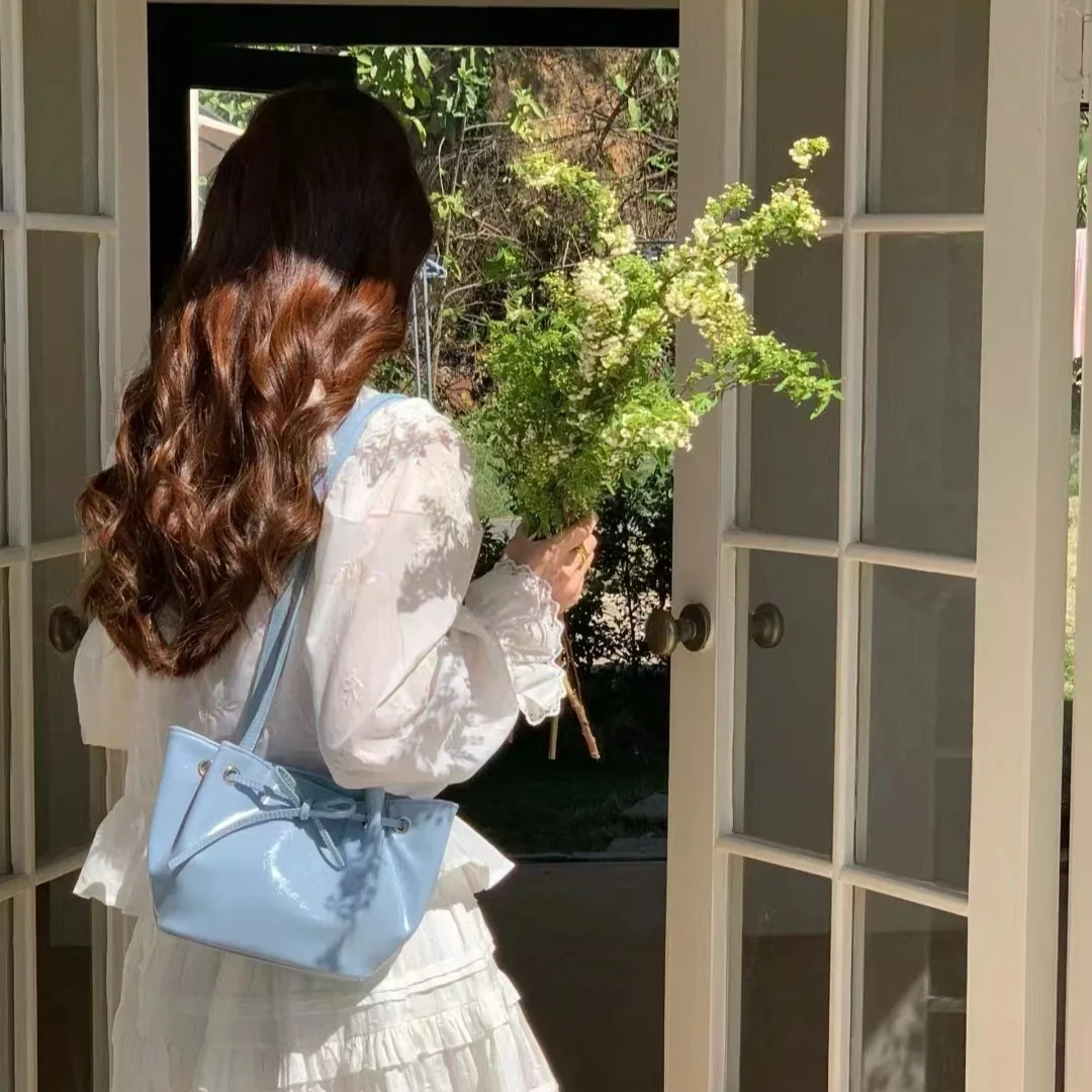 

Underarm bag, female niche design, high-end butterfly bow fashion, commuting single shoulder hand-held bucket bag