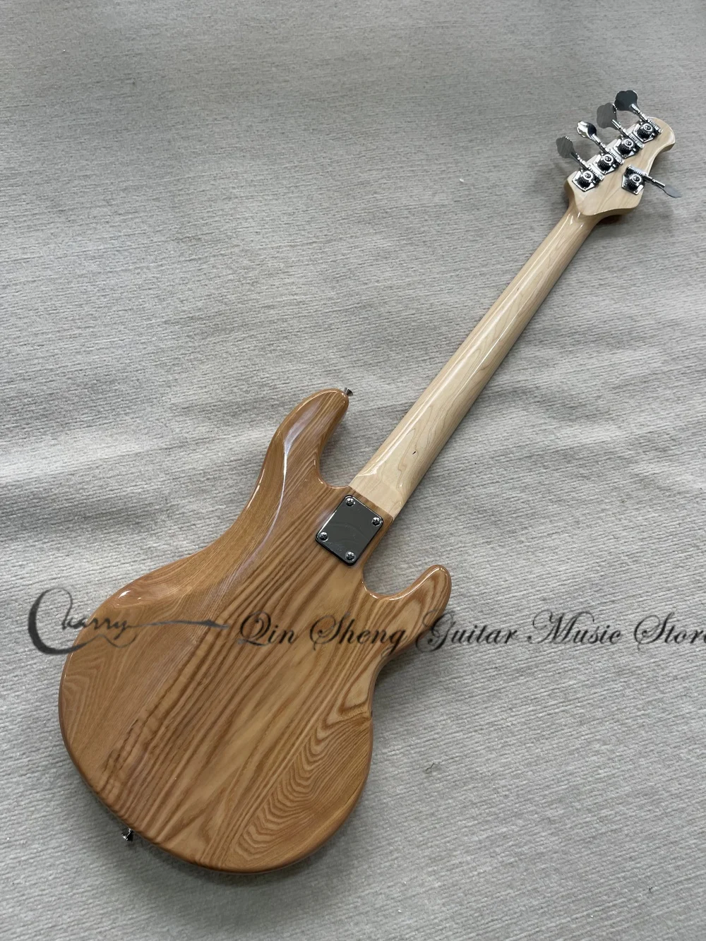 Left-handed bass, 5-string natural bass, Ash wood body, bridge, black pickup plate, chrome hardware. view 3