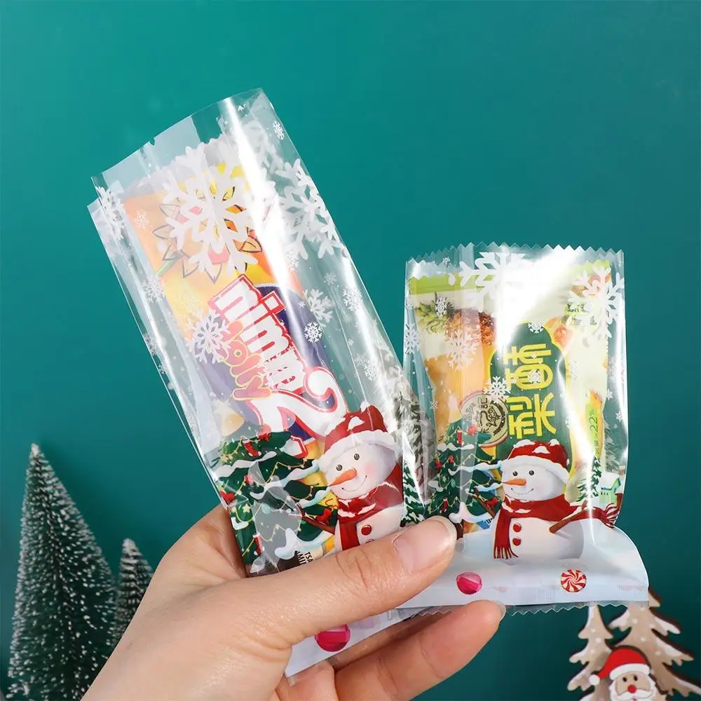 

50/100Pcs Plastic Christmas Snowman Cookie Bags Snowman Snowflake Pattern Thickened Candy Packaging Bags Transparent