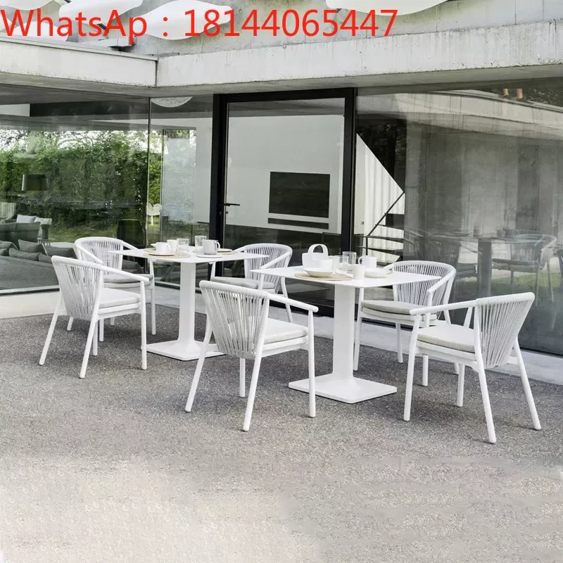 

Customized outdoor leisure tables and chairs rattan weaving waterproof sunscreen villa courtyard dining tables and chairs