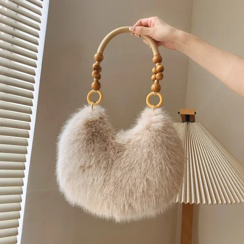 

Autumn and Winter Cute Handheld Hairy Bag for Women 2024 New Plush One Shoulder Underarm Bag Versatile Commuting Dumpling Paket