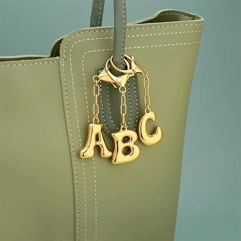

Creative Letter Bag Pendant Simple Fashion Interest Gift Unisex Versatile Decoration Metal Keychain High-grade Material Pendant