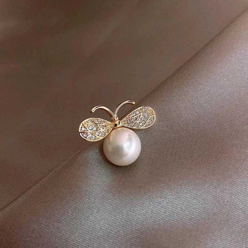 

Модная брошь-булавка с бантом и камнем «кошачий глаз» для женщин, универсальная и милая, предотвращает расстеливание лацканов, фиксирует модные воротники.