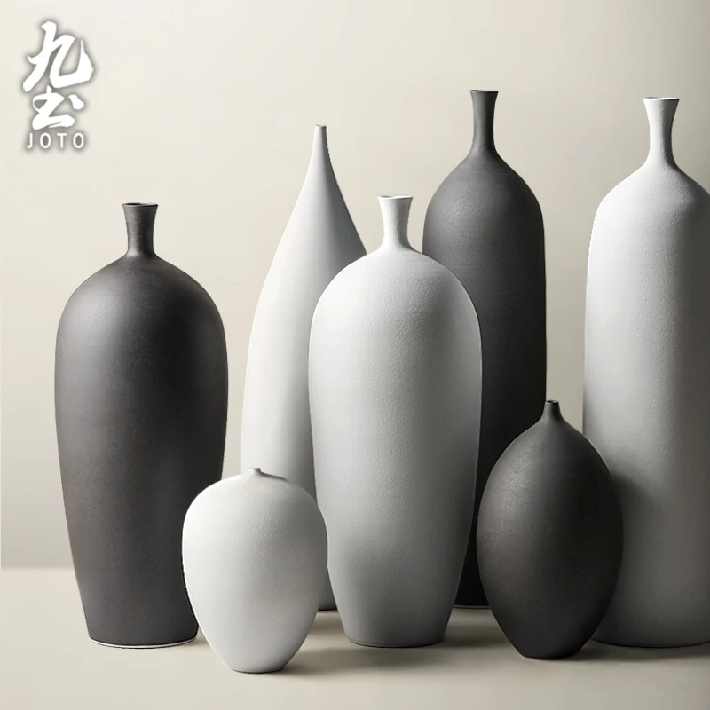 

JOTO Curved shape Beautiful atmosphere Handmade Creative Ceramic Vase DER0090