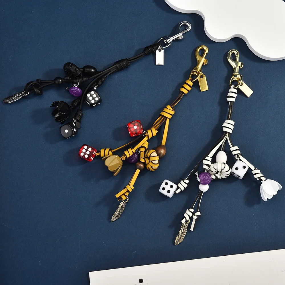 ثلاثي الألوان المنسوجة حبل الجلود النرد حقيبة مختلطة الديكور الإبداعية الأزياء سيارة المفاتيح الملحقات