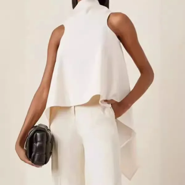 ยุโรปและสหรัฐอเมริกาฤดูใบไม้ผลิและฤดูร้อนไม่สม่ําเสมอ Hem เสื้อแขนกุดอารมณ์เสื้อเชิ้ตสีขาวผู้หญิง