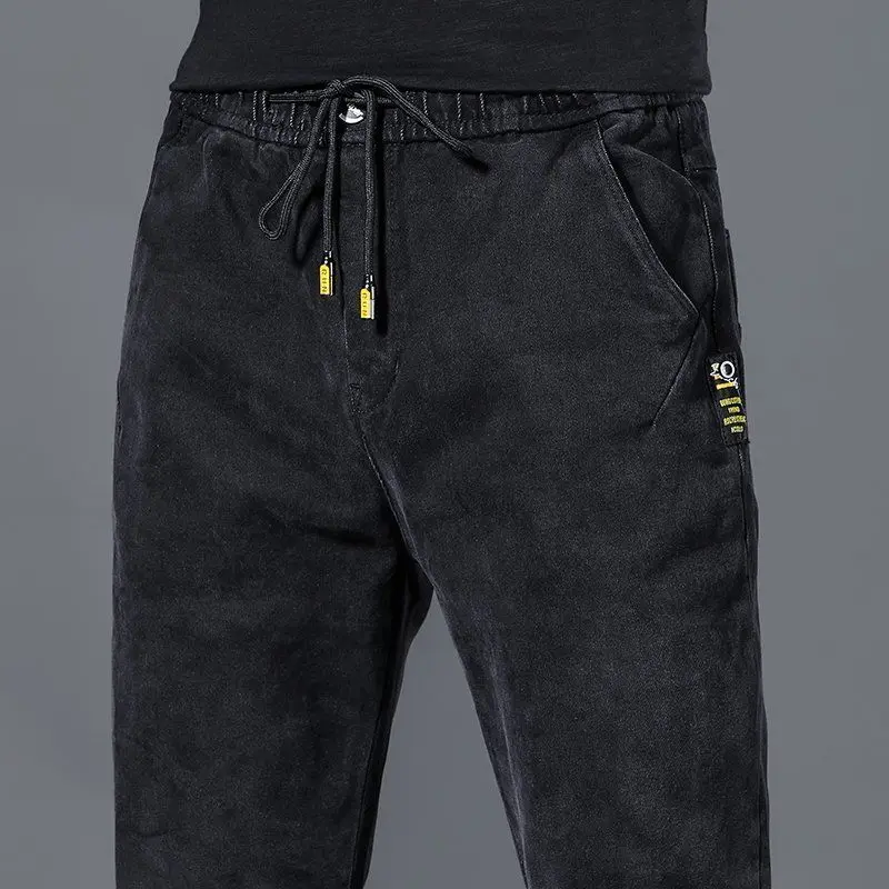 

Весенне-осенние новые тонкие джинсовые джинсы мужские с эластичной резинкой на талии тонкие прямые свободные повседневные длинные брюки большого размера эластичные брюки