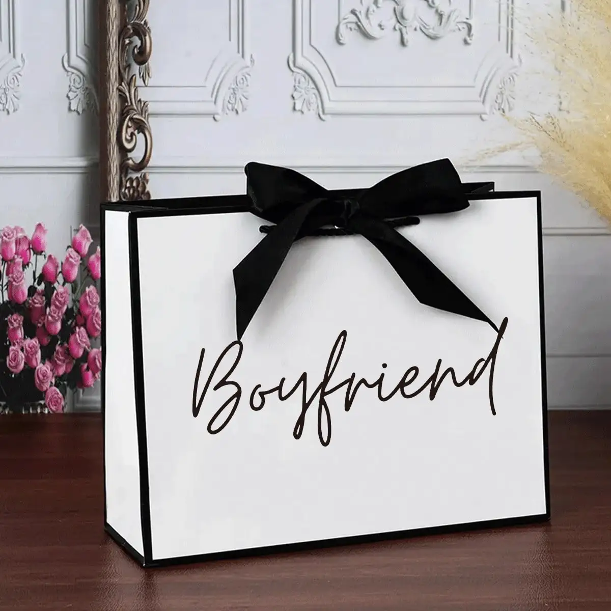 

Elegant White Paper Gift Tote with Black Satin Bow - Foldable Lightweight Shopping Bag