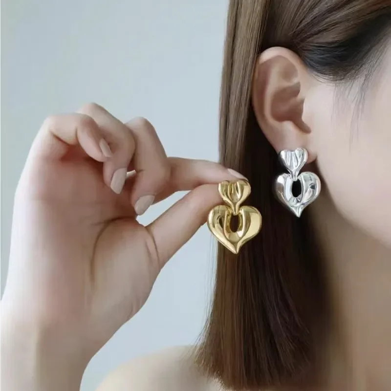 26 New heart buckle love earrings, simple and fashionable personality, versatile earrings, niche design, double love stud