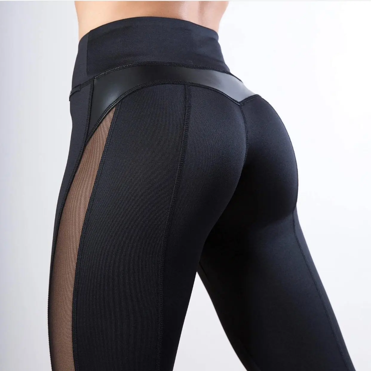 Moda de cintura alta Me PU empalme Sexy mujer Yoga deportes pantalones básicos de nueve piezas Leggings pantalones con zona para el pie fibra de poliéster