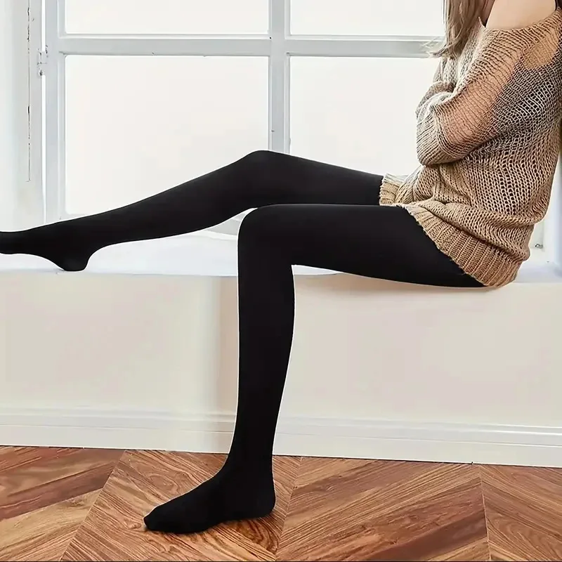 A pair of slim-fit tights, opaque high-waisted thermal stretch leggings, women's stockings and stockings