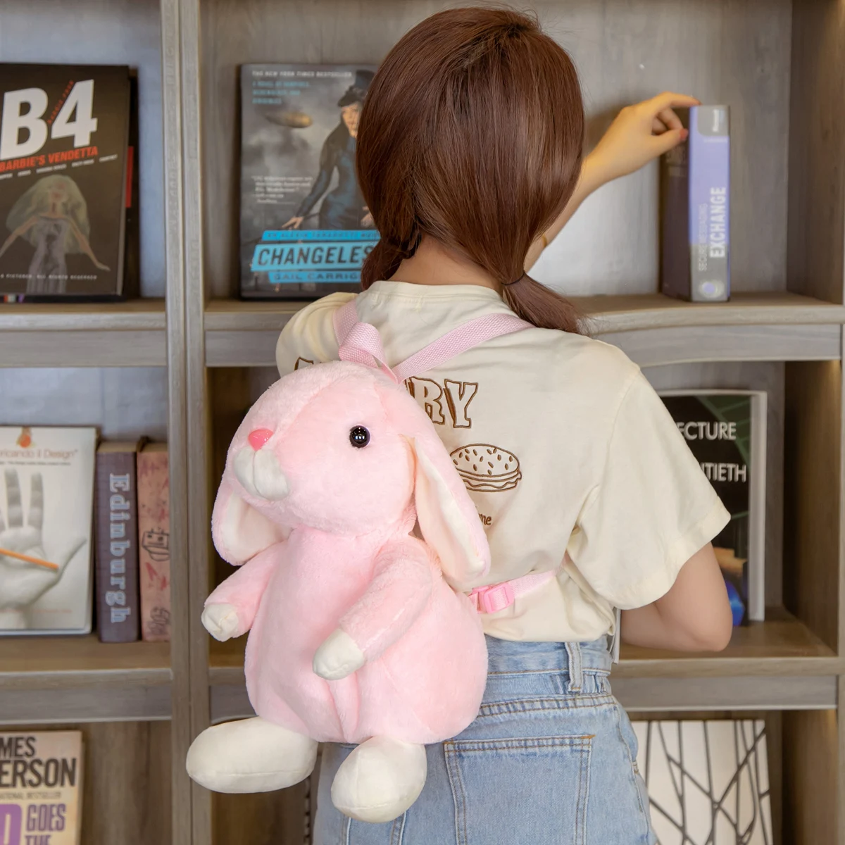 A cute plush droopy-eared rabbit backpack, a two-dimensional girl's heart creative soft and cute rabbit backpack, a birthday gif