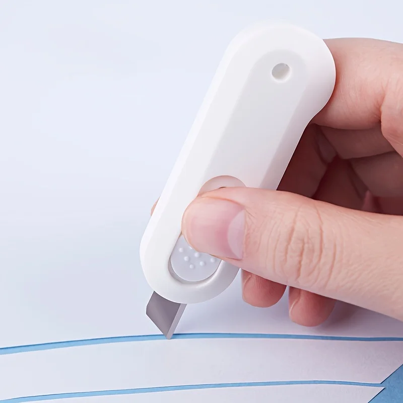 

Портативный мультипликационный мини - нарезной станок, открывающий коробки