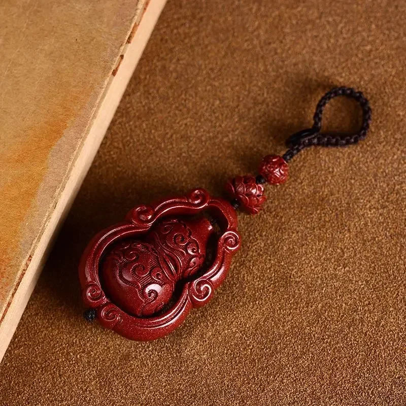 Natural cinnabar Xiangyun gourd keychain pendant for men and women this year high-end creative lotus peace car charm travel safe