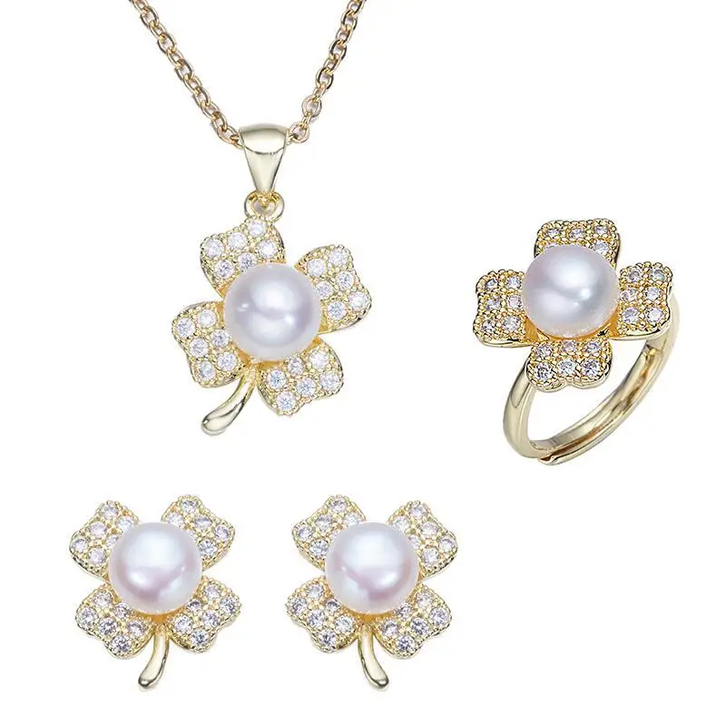 

Explosive four-leaf clover earrings pendant ring three-piece set