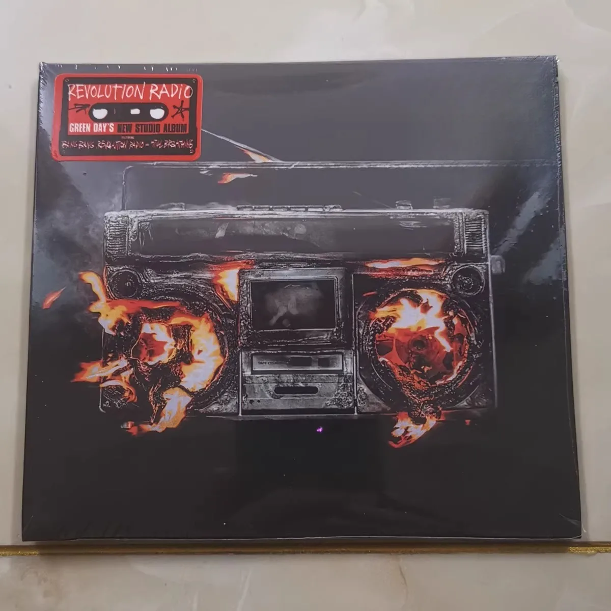 

Green Day Revolution Radio CD Pop Punk Energy Dynamic Riffs Powerful Vocals Classic Modern Punk Album for Music Collectors