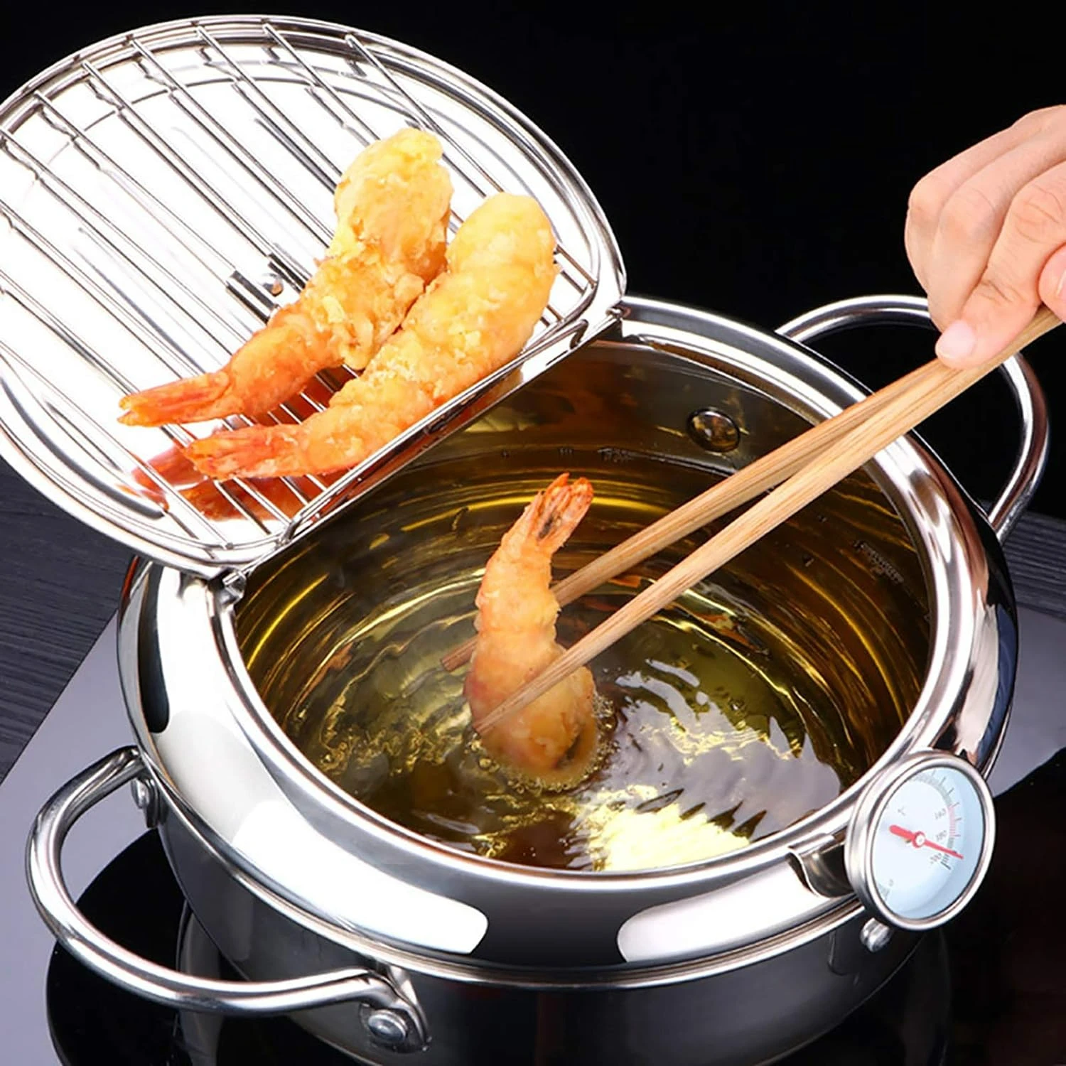 Upgrade your cooking with 24cm stainless steel tempura frying pan - crispy perfection every time. Lid, thermometer, oil drip rac