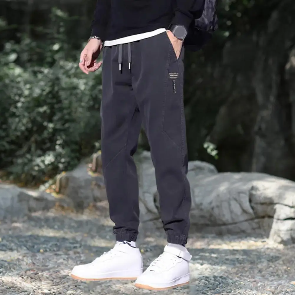 

Cozy Fleece-lined Trousers Thick Plush Drawstring Men's Pants with Ankle-banded Elastic Waist Solid Color Pockets for Warmth