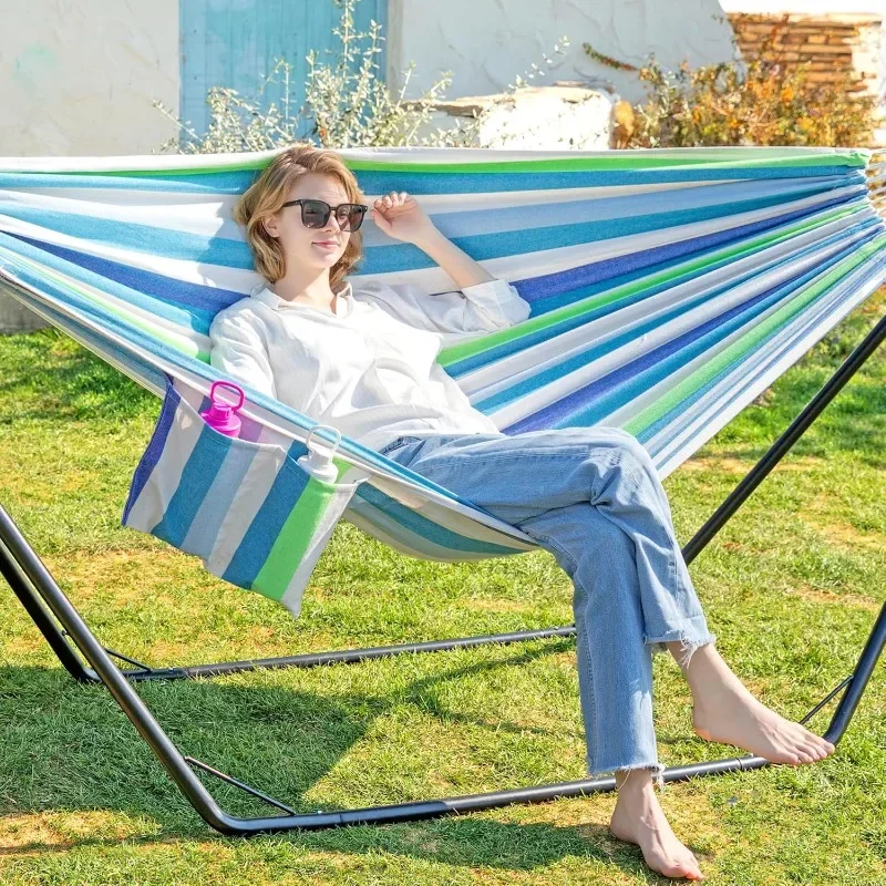 

Outdoor hammock with stand, comfortable pillow and convenient side pockets for indoor and outdoor use