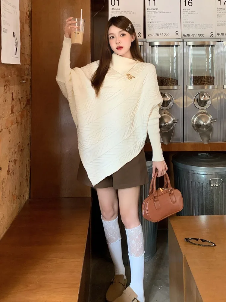 Autunno e inverno Nuovo design coreano Collo alto irregolare Torsioni di pasta fritta Mantello Maglieria Celebrity Street Maglione a maniche lunghe