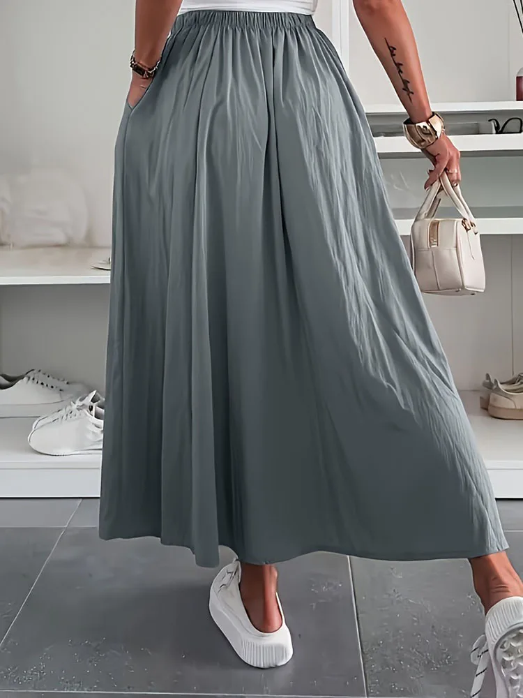 الصيف البوهيمي الشاطئ المرأة تنورة الشارع الشهير عادية بلون مكتب تنانير للسيدات 2025 الربيع عالية الخصر فضفاض ألف خط تنورة