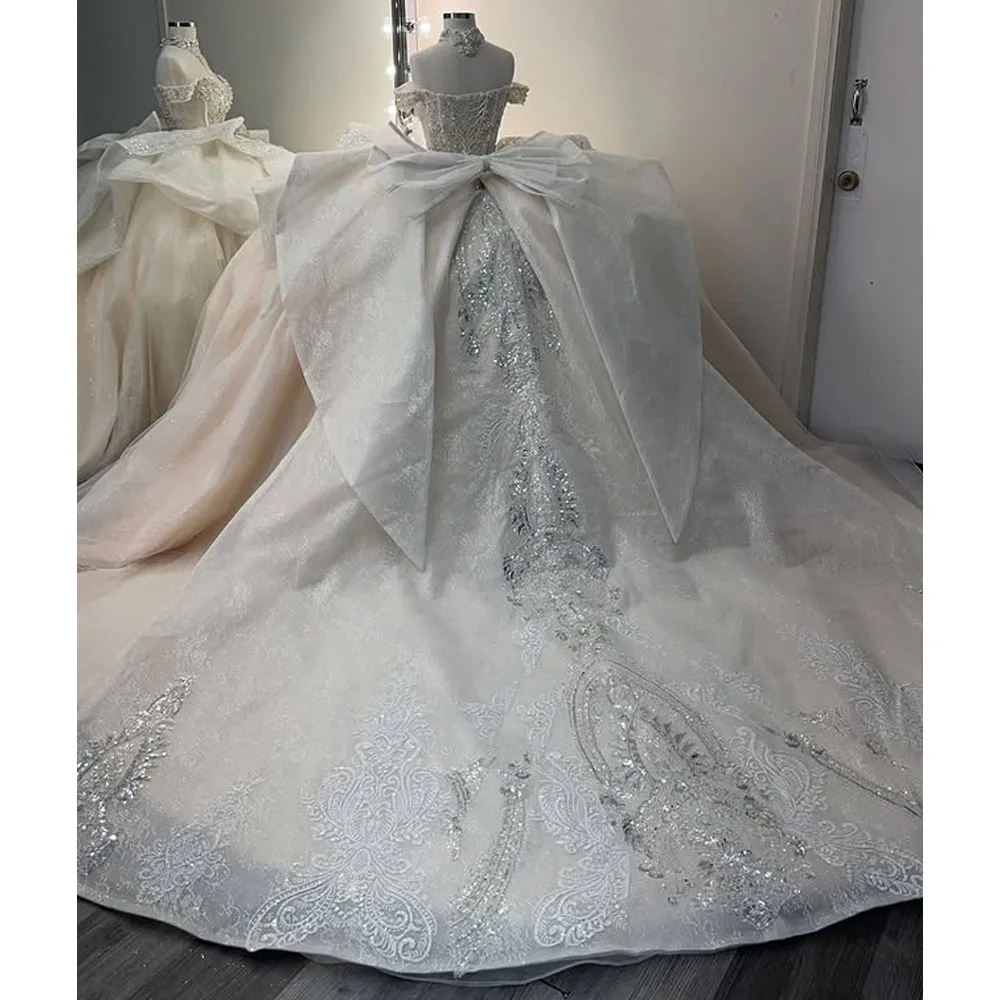 Rosa Quinceanera-Kleider, Schleife, herzförmiges Korsett, glitzernde Spitzenapplikationen, Ballkleid für Teenager, Festzugskleid, individuell gestaltet