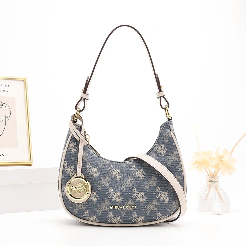 

Роскошная функциональная дизайнерская сумка для подгузников для женщин, модная вместительная сумка-тоут, элегантная кожаная сумка через плечо, практичная.