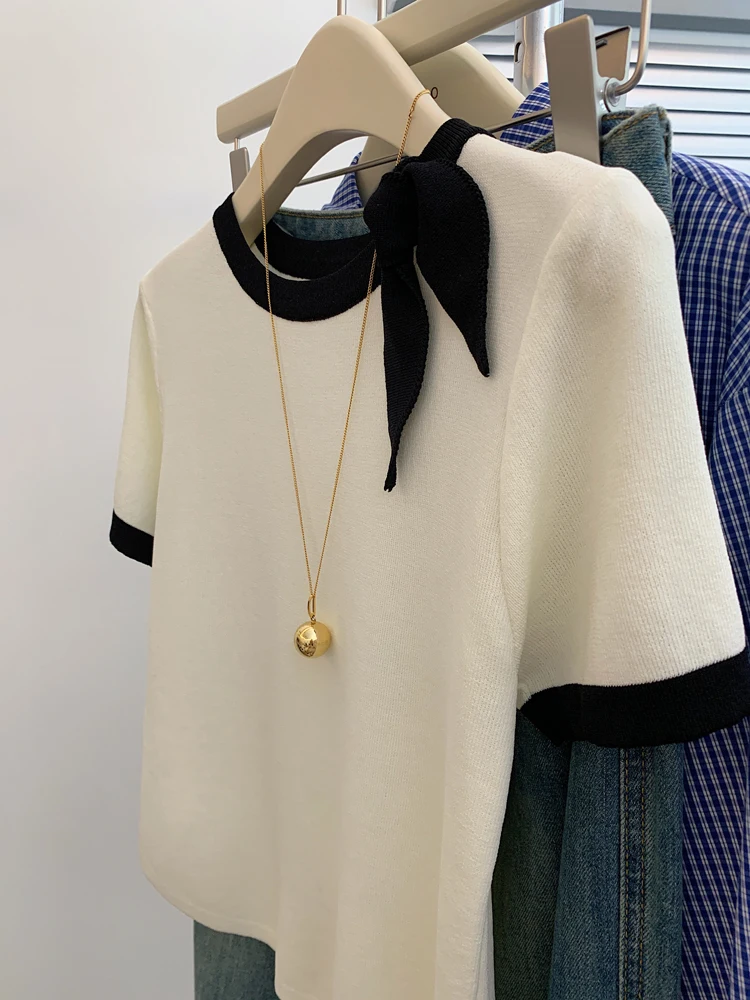 تي شيرت نسائي كبير الحجم مع عقدة من الحرير الجليدي المحبوك ort Sve الكورية Sle تصميم الصيف الإحساس العمر المخفض...