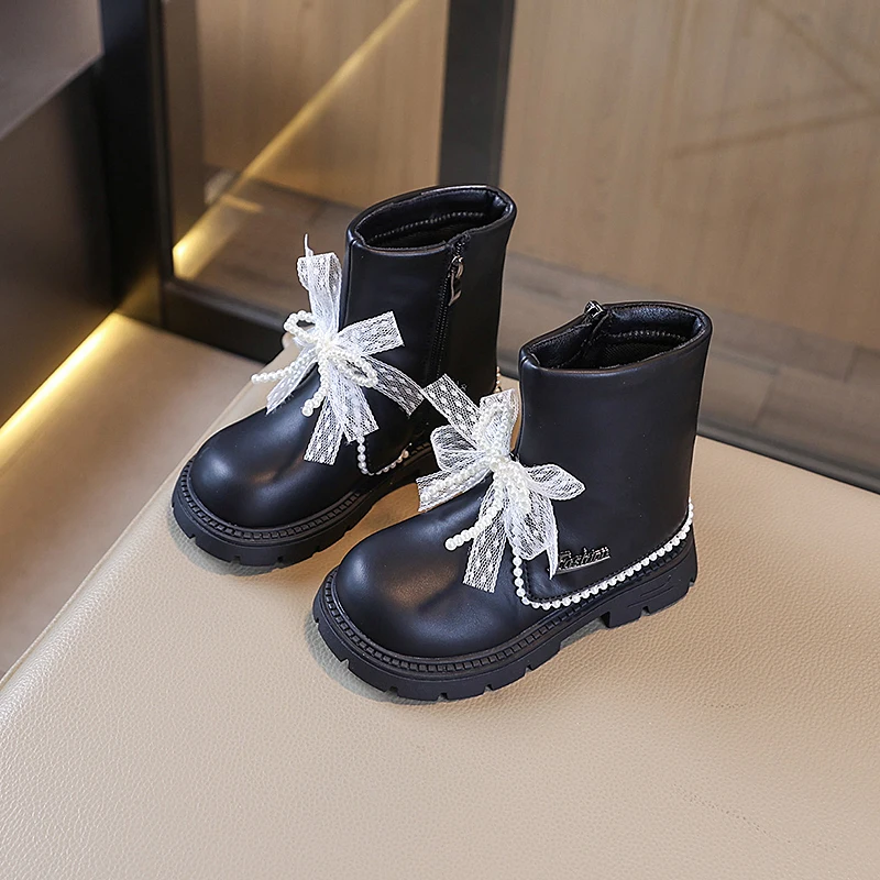 2025 nouvelles filles bottes doublées en peluche mode arcs perles conception enfants chaussures d'hiver haut antidérapant luxe enfants botte en cuir