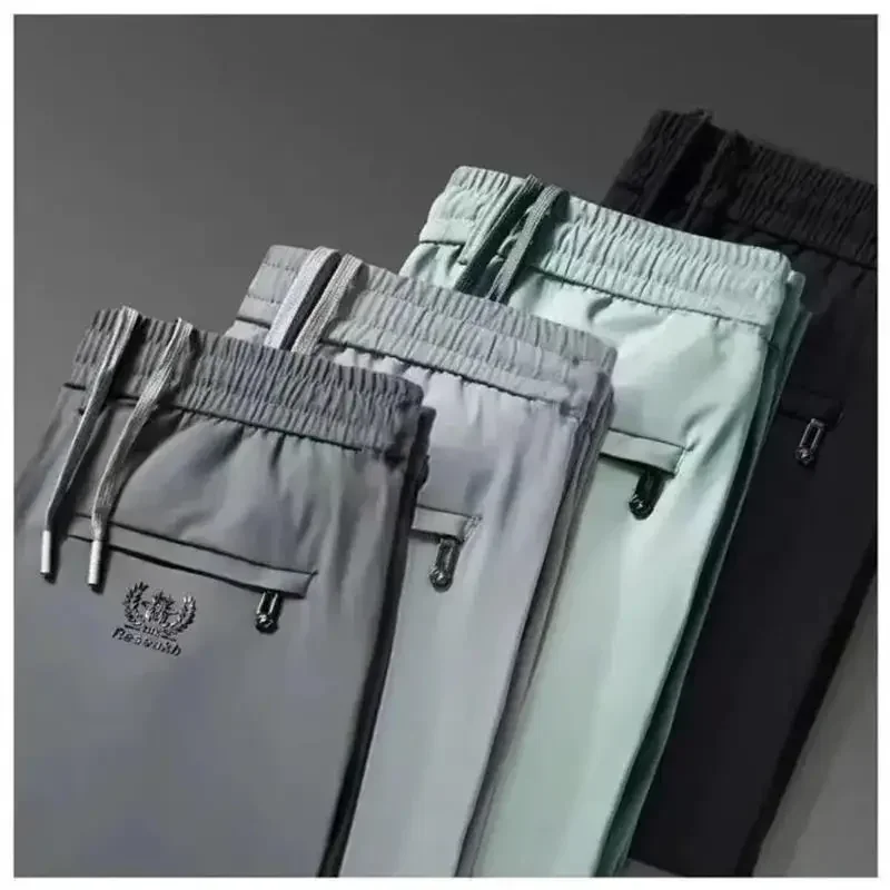 

Ультратонкие мужские повседневные спортивные штаны с эластичной резинкой на талии, деловые брюки свободного кроя, ледяной шелк, весна-лето, тонкие стильные мужские брюки