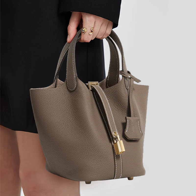 

Aidrani Structured Bucket Bag: Premium Leather with Gold - Tone Lock
