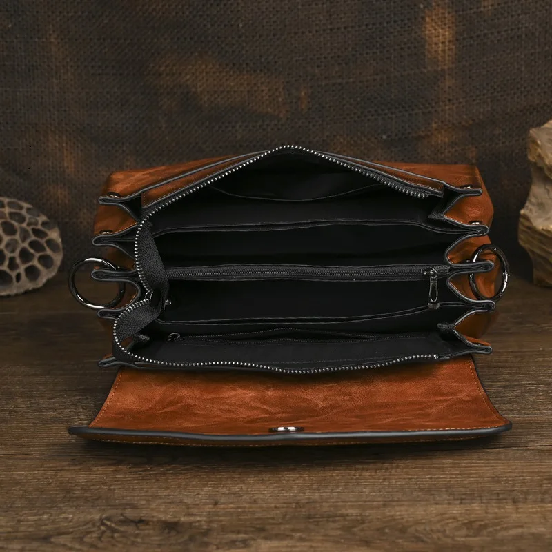 Johnature 2026 New Retro Leather Carving Handbag Versatile Large Capacity Chinese Style Shoulder Crossbody Bag