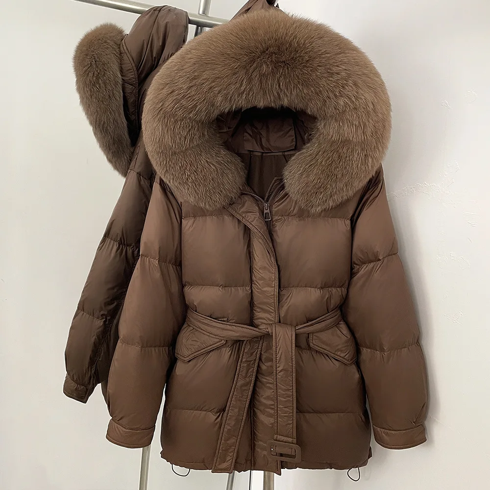 Stile coreano elegante collo di pelliccia di volpe di fascia alta con cappuccio giacche longuette inverno casual allentato spesso caldo cintura sottile piumini da donna