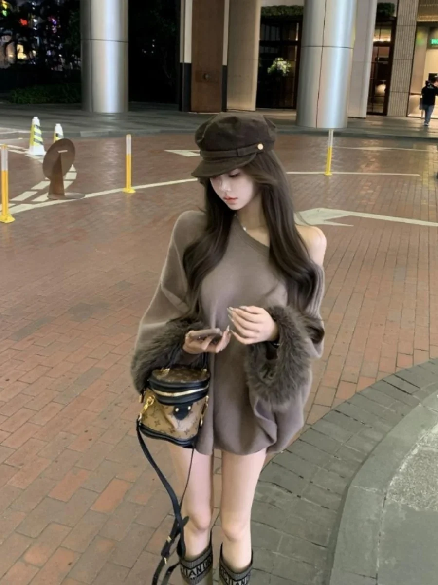 

Сексуальный вязаный свитер с наклонным воротником и колючками, длинный свеч, женский свободный накладной осенний сезон, норковый лоскутный ленивый универсальный...