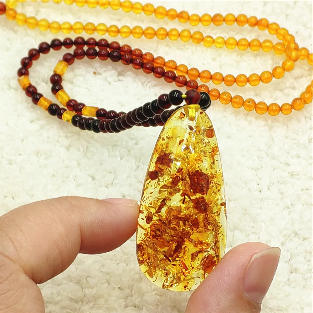 

Кулон из натурального янтаря Piebald для женщин и мужчин, желтый янтарь, 45x21x10 мм, кулон из драгоценных камней, ожерелье, ювелирные изделия AAAAA