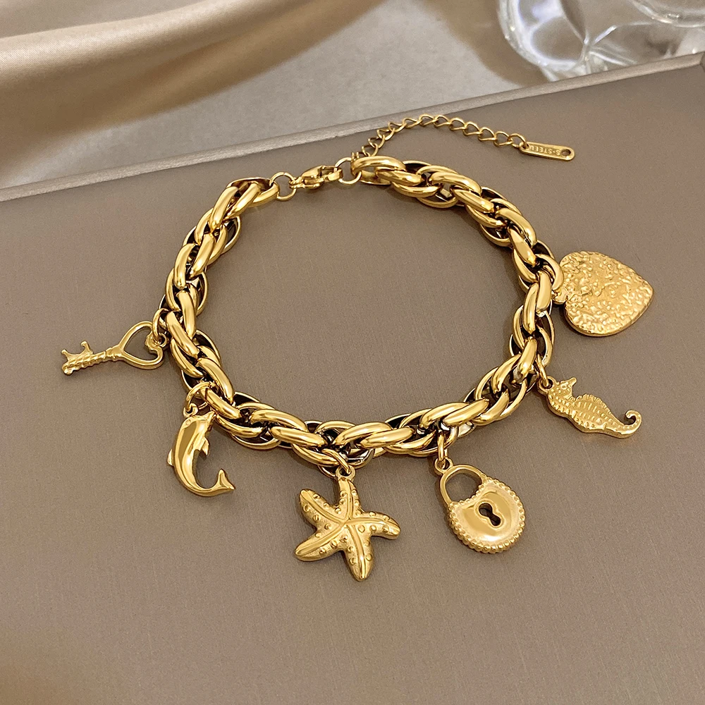 

DODOHAO Creative Stainless Steel Chunky Chain Bracelet Women Ocean Style Seahorse Starfish Dolphin Pendant Bracelet Boho Jewelry