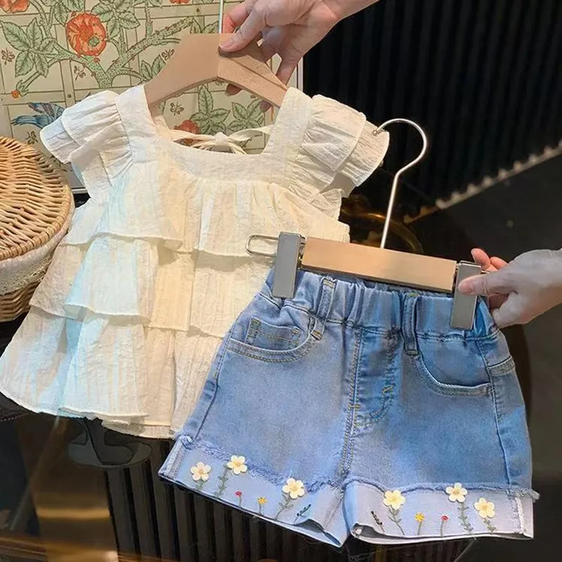 

Girls Summer Set 2024 New Children's Cowboy Embroidered Shorts Baby Ruffle Edge Tank Top Skirt Two Piece Set Trendy