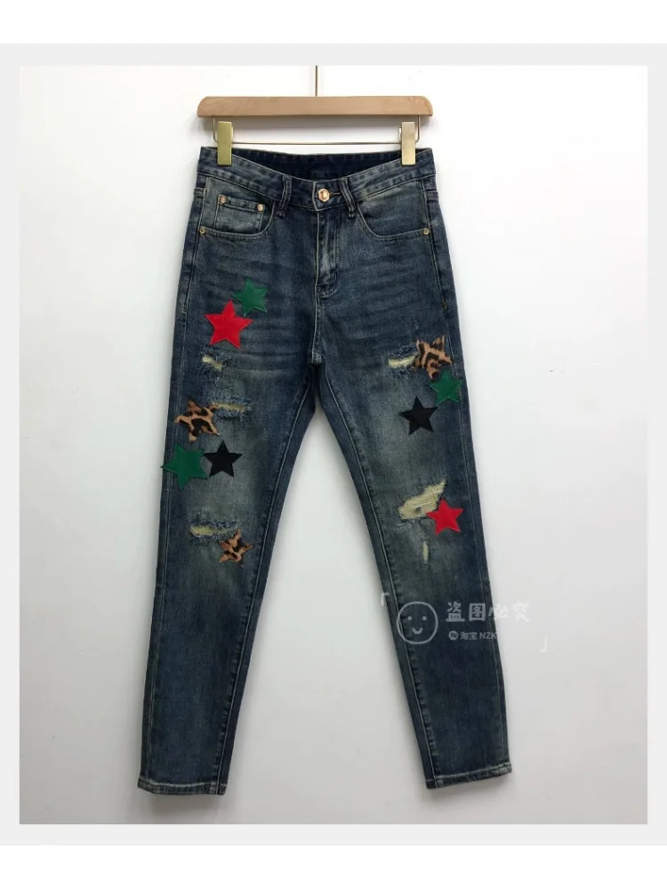 Modische Jeans mit Sternaufkleber-Aufdruck für Herren, trendige Marke, schmale Passform, kleiner Fuß, elastische Distressed-Retro-Denim-Freizeithose