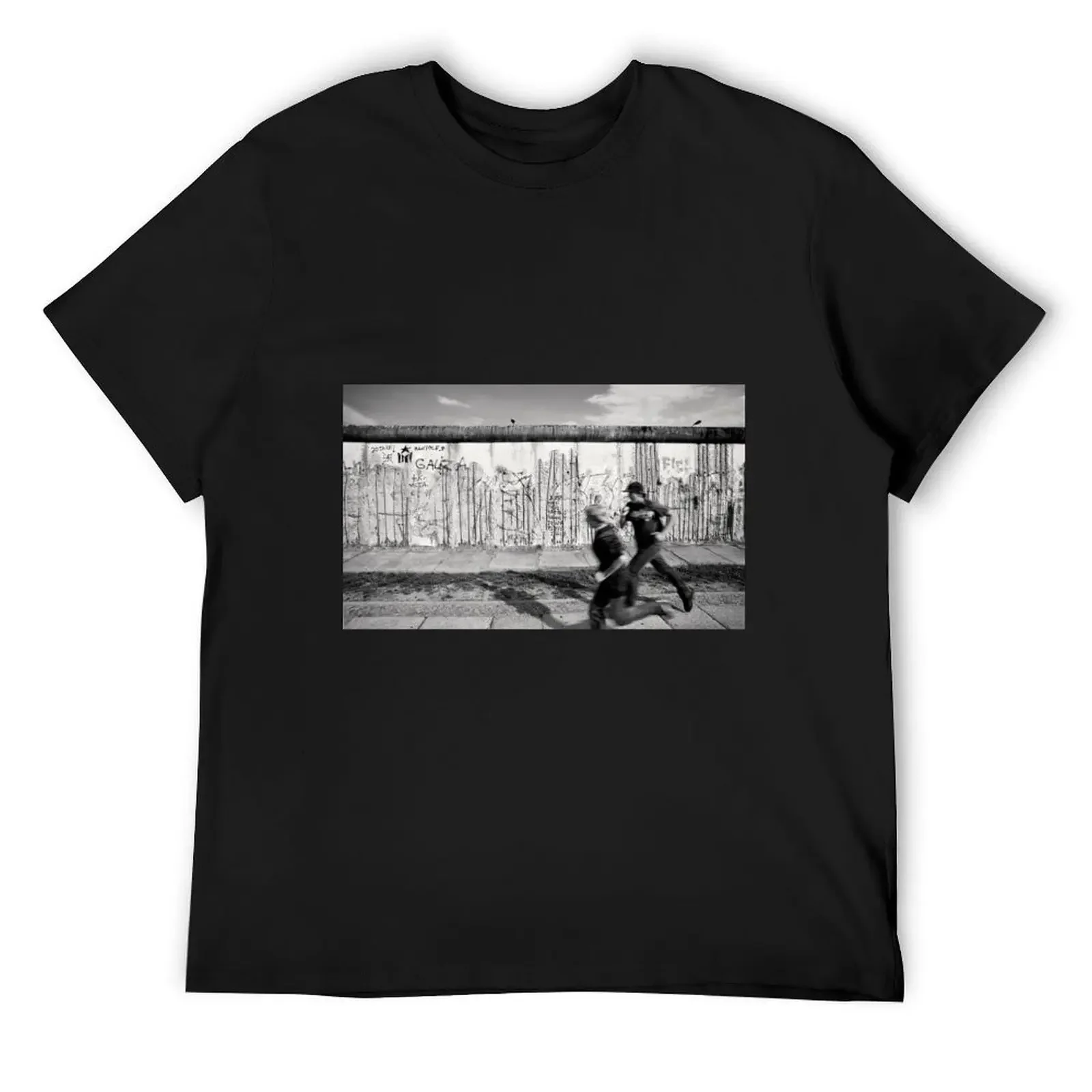 

Two kids running along the remains of the Berlin Wall, Berlin, Germany T-Shirt anime t shirts plus size tops sweat shirts, men