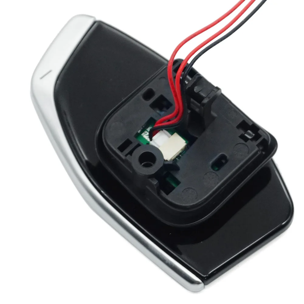 Für Audi A6C8 plattierte Schaltwippen am Lenkrad, silberner Rand, schwarz plattierte Schaltwippen. – Detail 5