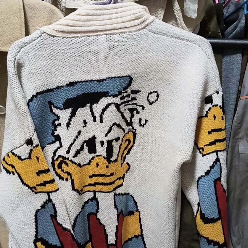 Donald Duck pull Disney Anime dessin animé femmes manteau automne/hiver Cardigan ample tricoté pull haut décontracté fille vêtements cadeau