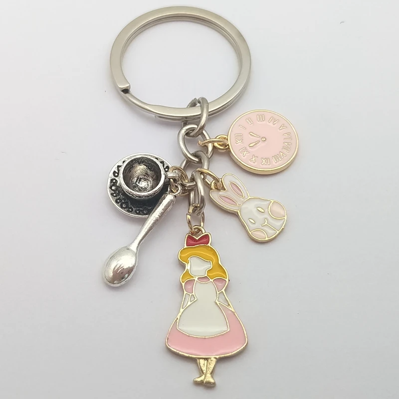 1 piece of high-quality fashion jewelry Alice in Wonderland keychain, coffee cup watch rabbit spoon keychain, clock keychain