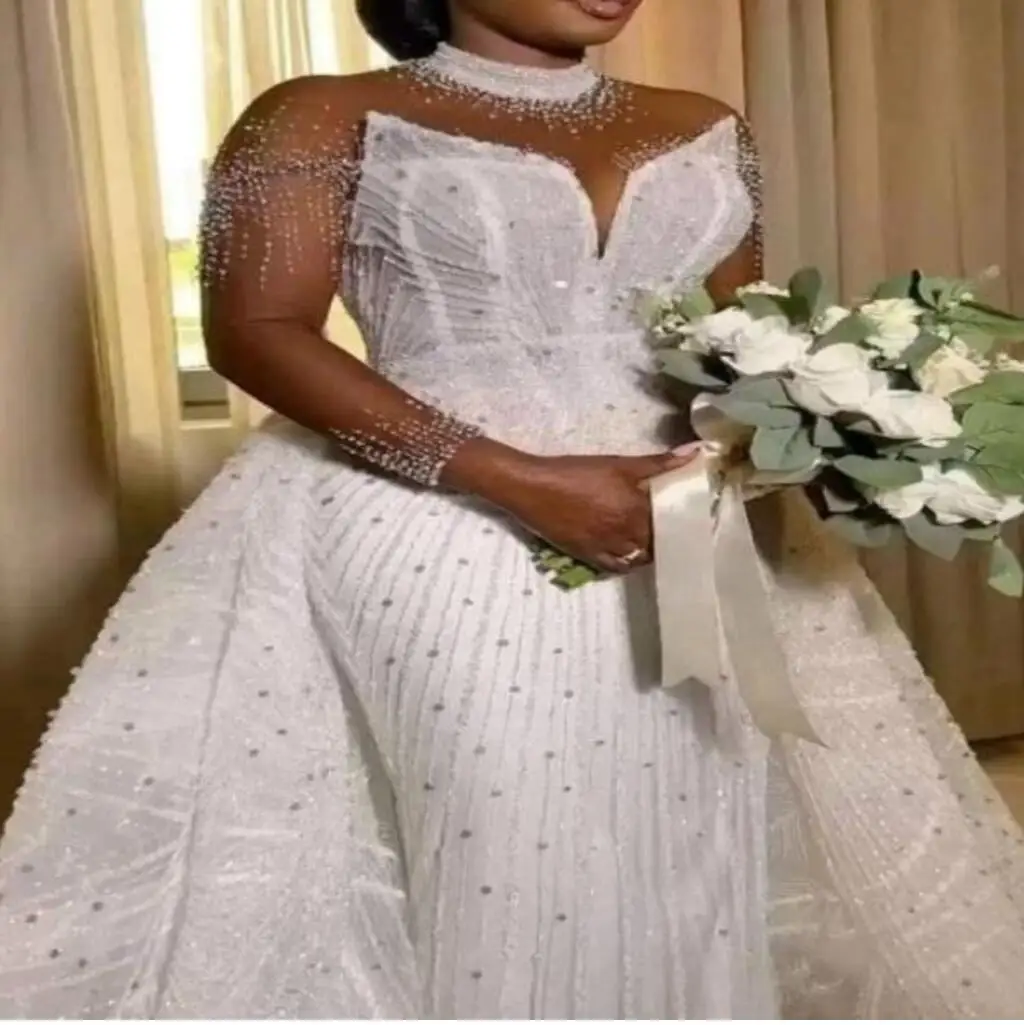 

Customized Luxury Africa Mermaid Wedding Dresses Detachable Train High Neck Heavy Beaded Lace Long Sleeves Fish Tail Bridal Gown