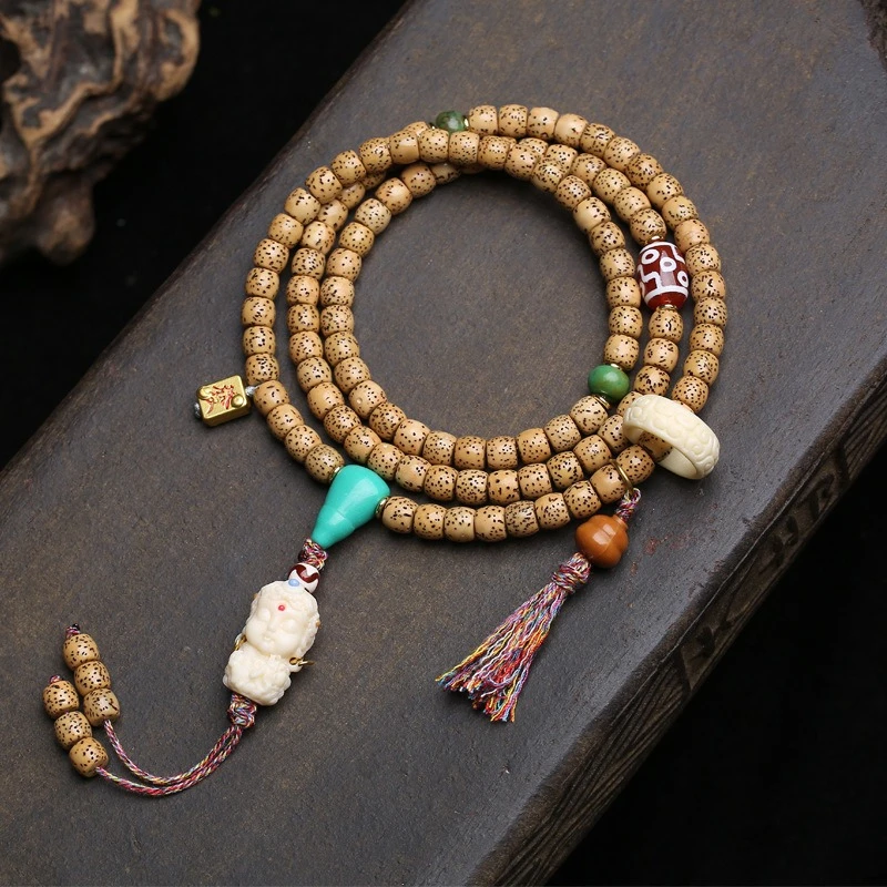 108-bead Buddha beads, featuring a star-moon Bodhi, ivory fruit, green Tara, nine-eyed dZi beads, and accessories