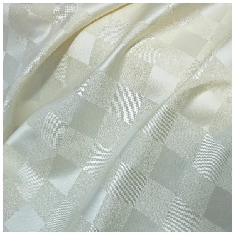 This is a designer fabric for trend autumn and winter featuring oak silk wool diamond-shaped checkered jacquard satin