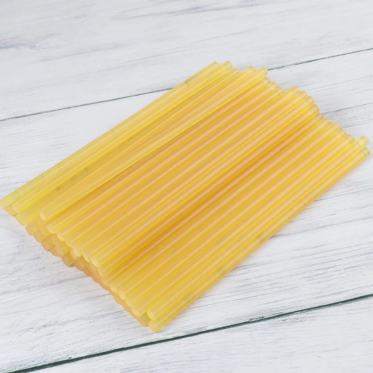 

100Pcs Hot Melt Glue Sticks Strong Adhesive Glue Strips Cuttable Glue Sticks for Home Shop Store (Yellow)