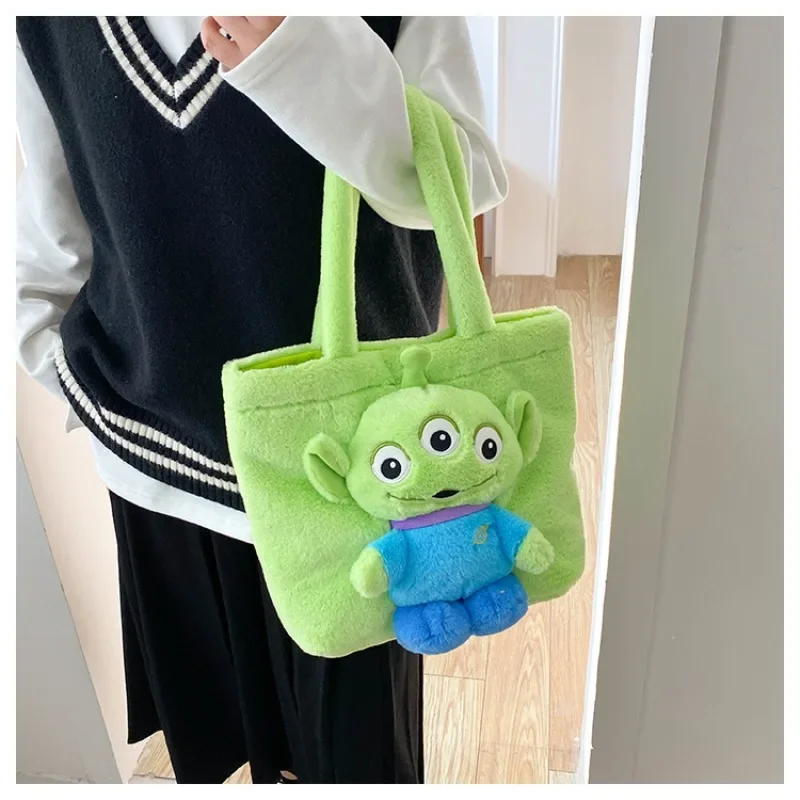 Nuevo bolso de hombro de muñeco de peluche de dibujos animados de Disney, bolso de mano suave y bonito con punto de oso de fresa para niñas