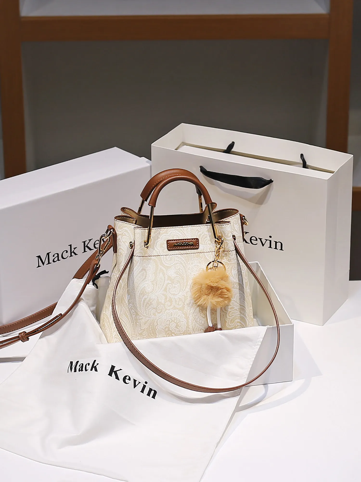 Luxury and Elegant Handheld Bucket Bag with Delicate Flower Printing and Cute Doll Pendant 2026 Women New Fashion Crossbody Bag